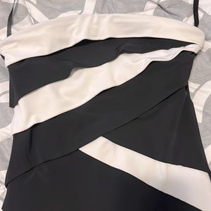 Black & white slimming strapless (optional straps included) dress.